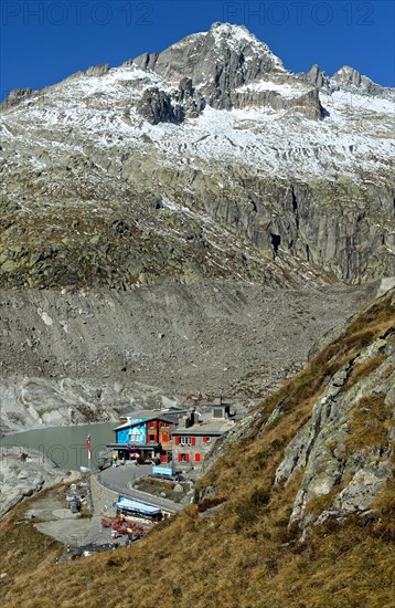 At the entrance to the ice grotto in the Rhone glacier