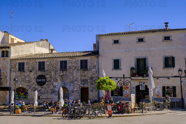 Sidewalk cafes in front of the church