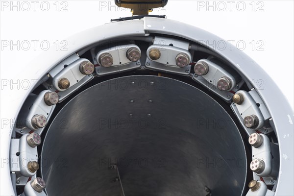 Nozzles on the inner rim of a propeller gun