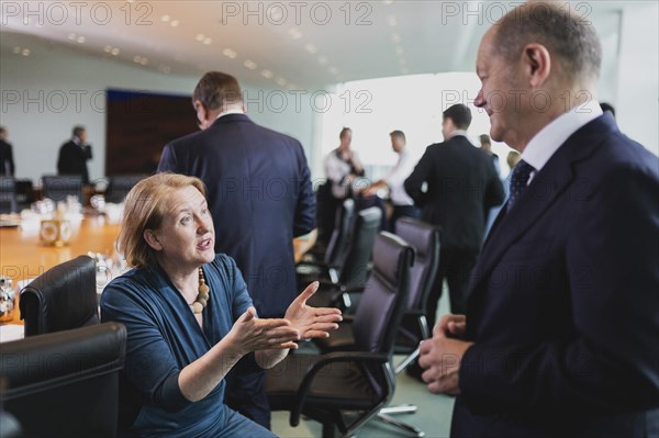 (L-R) Lisa Paus (Buendnis 90 Die Gruenen), Federal Minister for Family Affairs, Senior Citizens, Women and Youth, and Olaf Scholz (SPD), Federal Chancellor, photographed during the weekly meeting of the Cabinet at the Federal Chancellery in Berlin, 05.07.2023. The Cabinet intends to adopt the draft for the 2024 federal budget at this meeting, Berlin, Germany, Europe