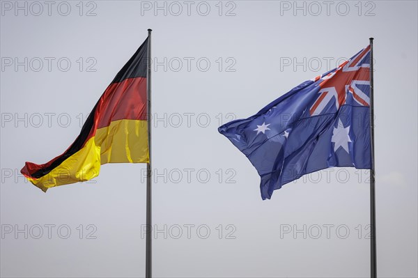 The flags of Germany and Australia in front of the Federal Chancellery in Berlin