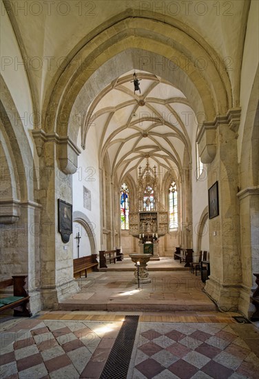 Gothic choir room with altar and baptismal font