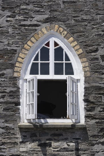 Gothic style windows on the former schoolhouse in Port Isaac