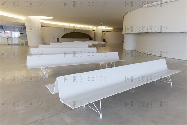 Waiting room with white benches in the cruise terminal