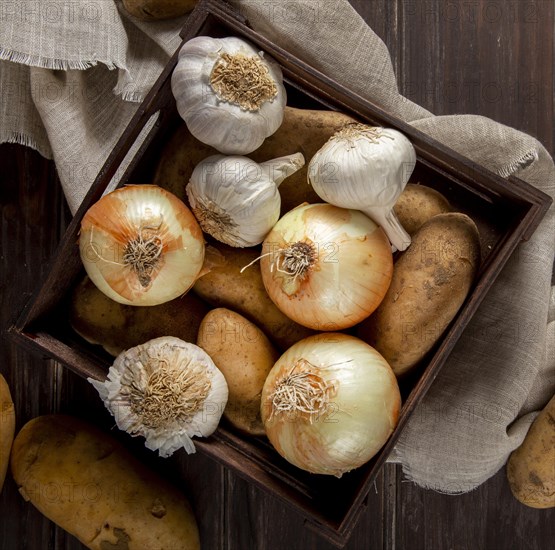 Top view garlic onions crate