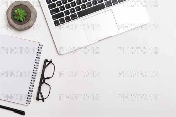 Workspace with laptop white background