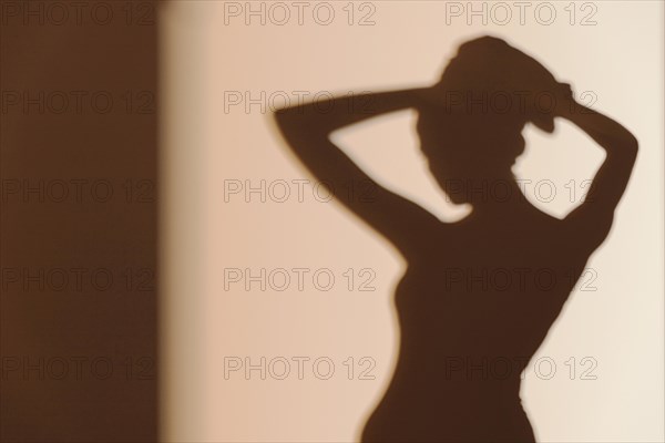 Silhouette graceful woman after shower