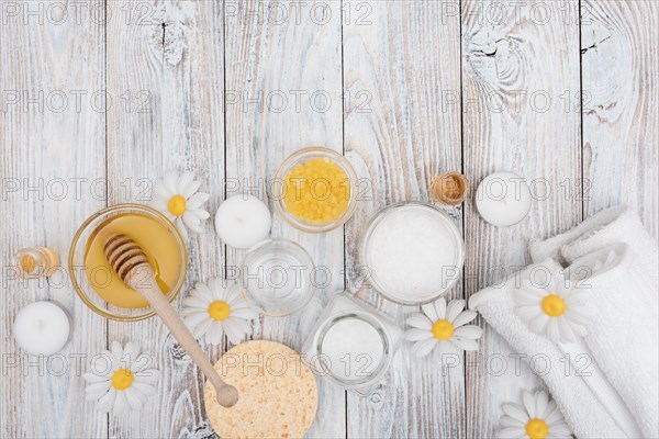 Wooden background with spa essentials