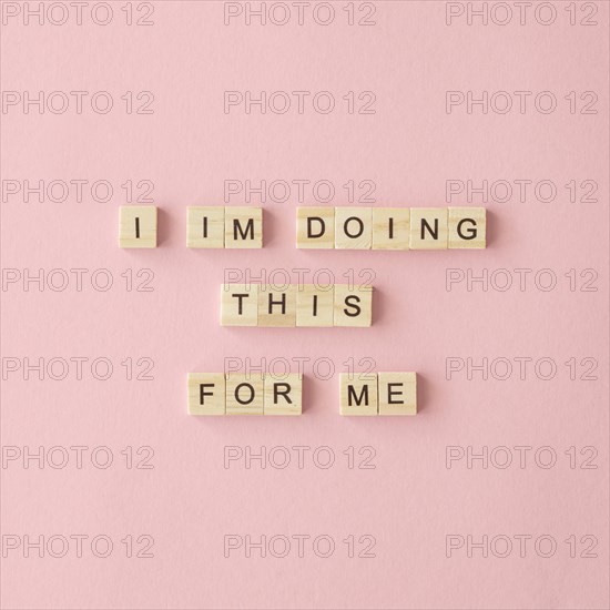 Motivational text pink background