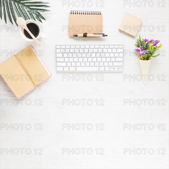 Cozy workplace with keyboard notebook