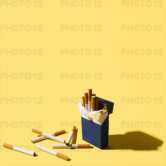 Cigarettes pack yellow background
