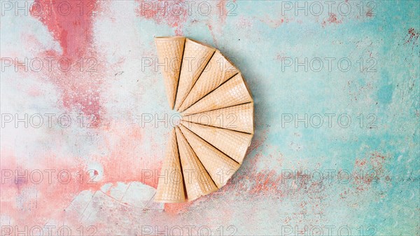 Fan shaped empty waffle horns colorful background