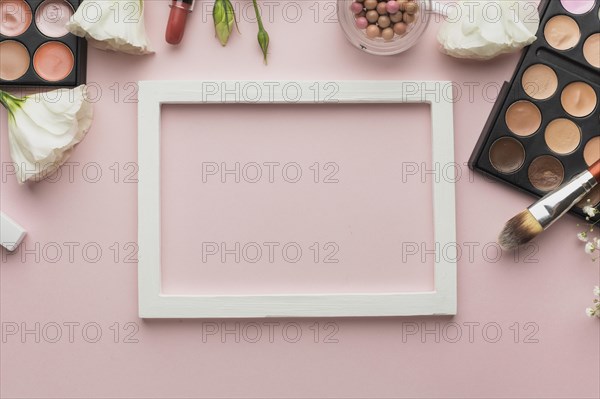 Flat lay assortment make up products frame