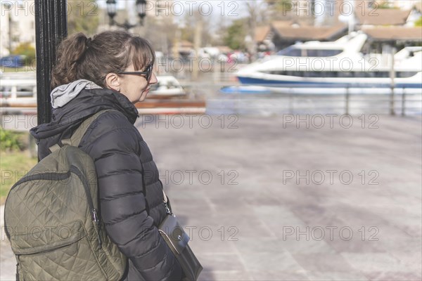 Portrait of a tourist walking along Paseo Victorica