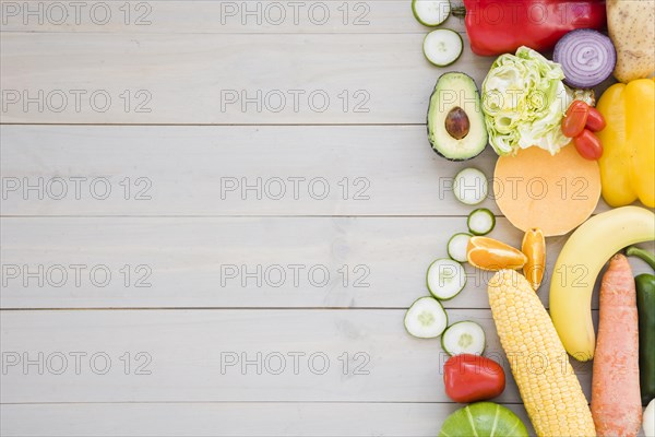 Colorful vegetables wooden desk backdrop
