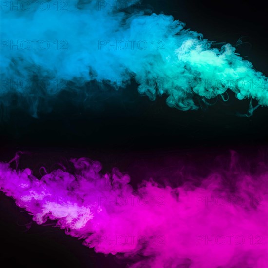 Blue pink smoke effect black background