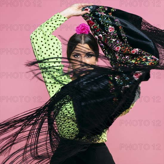 Flamenco dancer moving manila shawl