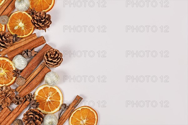 Seasonal winter flat lay with dried orange slices