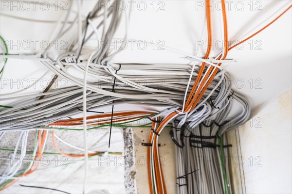 Electric cable on the ceiling of a flat