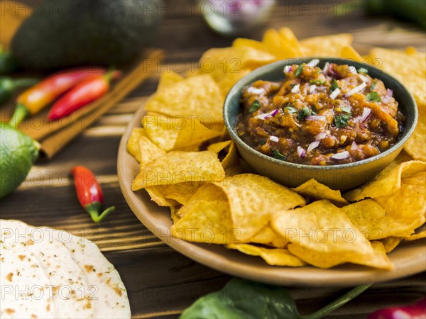 Plate nachos with salsa dip