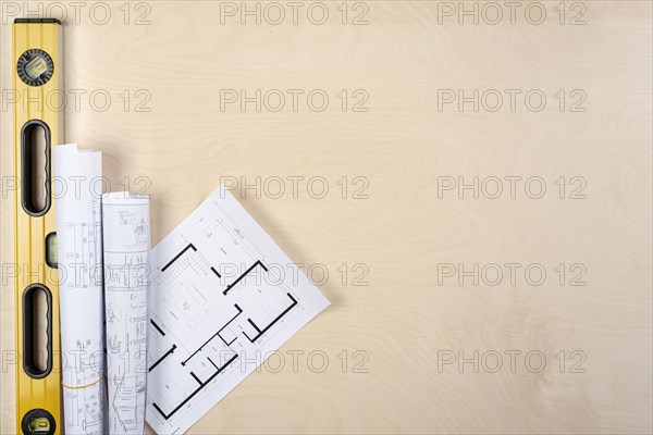 Flat lay architectural plans desk with copy space