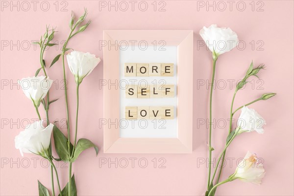 Top view pink frame flowers arrangement