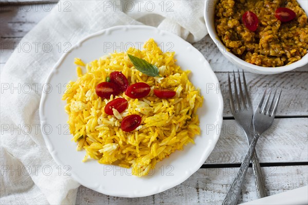 Vegan indian food with rice tomatoes