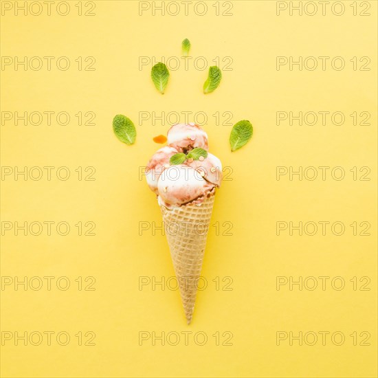 Ice cream waffle cone with syrup mint