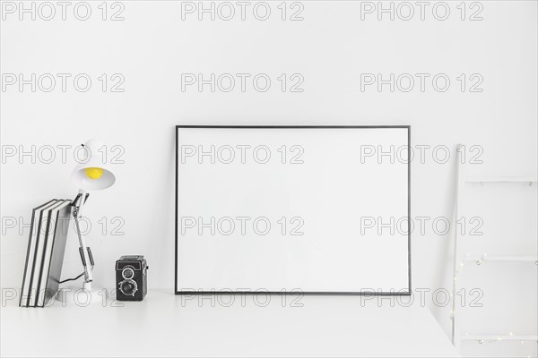 Stylish minimalistic workplace white color with whiteboard