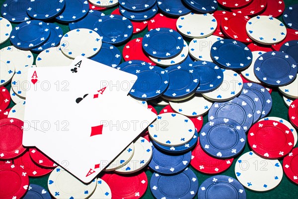 Three aces card white blue red casino chips