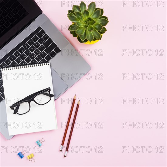 Top view desk concept with laptop