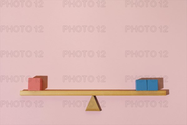 Arrangement with wooden cubes
