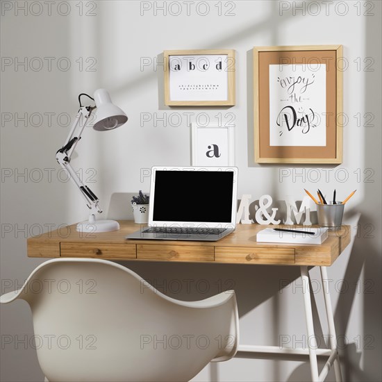 Nice organised workspace with lamp