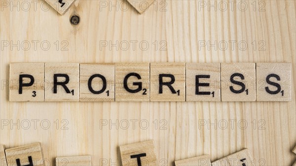 Progress word wooden tiles