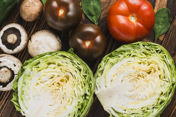 Cabbage near mushrooms tomatoes