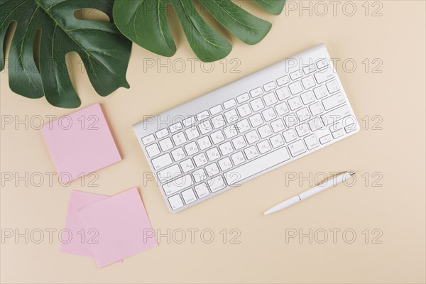 Keyboard with stickers pen yellow table