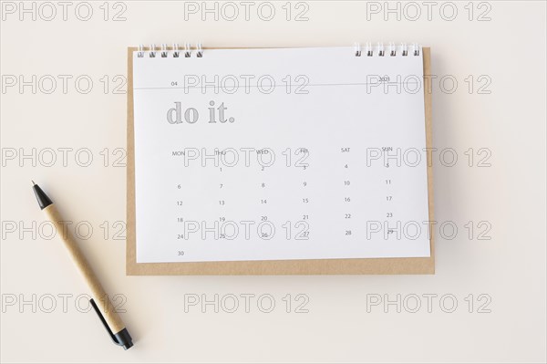 Flat lay planner calendar pen