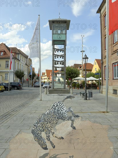 Bell tower with street painting on the historic market square