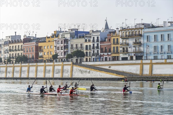 Kayaks on the Guadalquivir River in front of the Triana neighbourhood