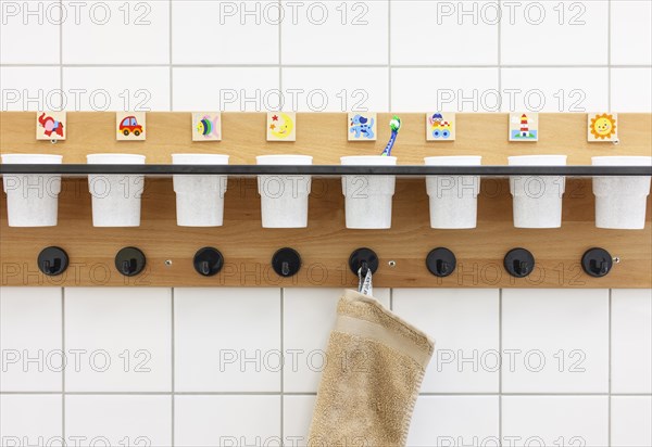 Empty toothbrush cups and towel hooks in a day-care centre in Duesseldorf