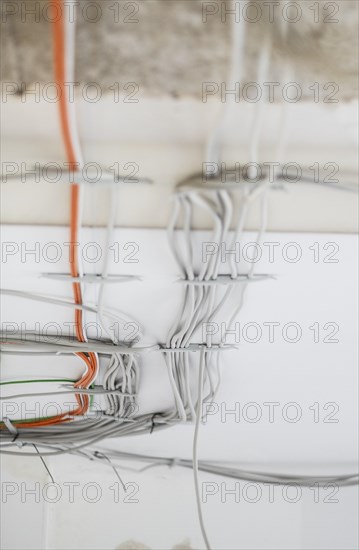 Electric cable on the ceiling of a flat