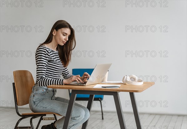Young business woman working laptop