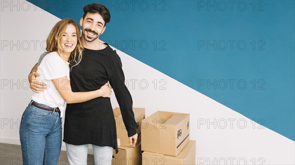 Loving couple moving new flat
