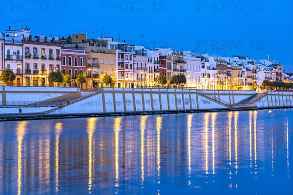 Triana neighbourhood on the banks of the Guadalquivir River at dusk