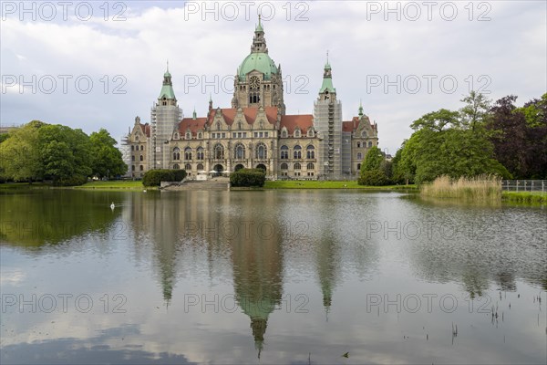 New Town Hall with reflection in the water at the Maschteich in the Maschpark