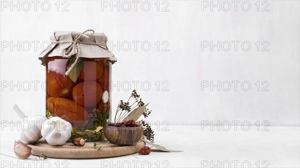 Jar with preserved vegetables