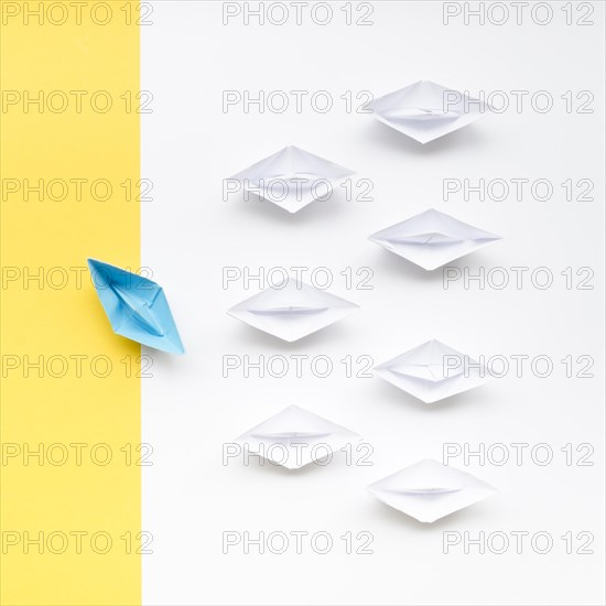Creative arrangement individuality concept paper boats