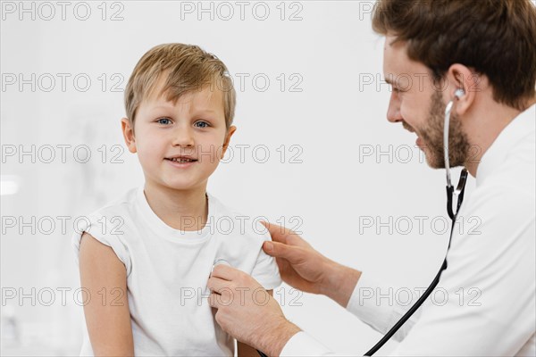 Doctor checking hear beat