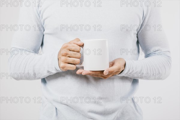 Male hands coffee mug