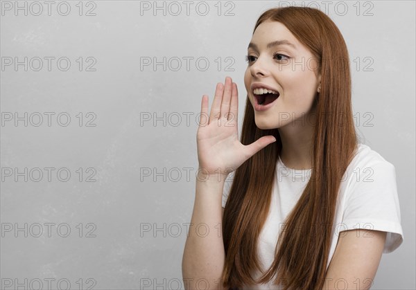 Woman shouting with copy space